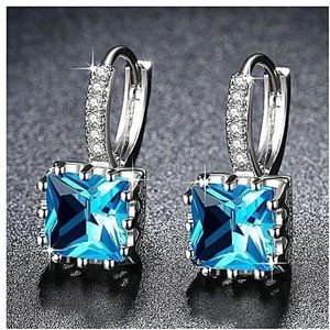Silver Icy Blue Sapphire Hook Emerald Cut Earrings